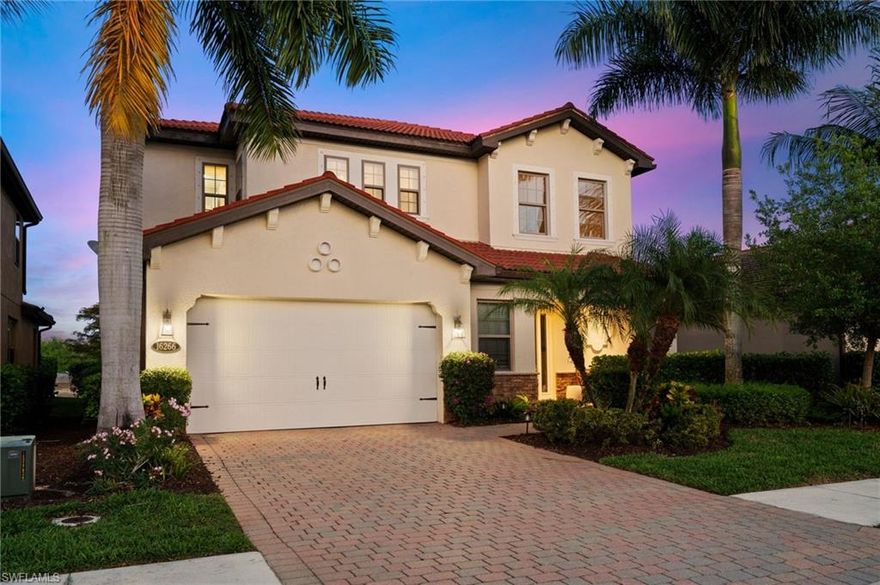 This exceptional 3,600-square-foot two-story residence offers a rare blend of space, thoughtful design, and an unbeatable North Naples location—perfectly tailored for families seeking both comfort and style. Featuring five spacious bedrooms and three and a half baths, the layout is ideal for family living, offering the perfect balance of open gathering areas and private retreats. At the heart of the home, the beautifully upgraded kitchen shines with 42-inch cabinetry, quartz countertops with a full backsplash, stainless steel appliances, and a generous eat-in area. It flows seamlessly into the expansive family room, creating a central hub that’s perfect for everyday living, entertaining, and staying connected. Natural light fills the space, enhanced by motorized interior shades that provide both convenience and a modern touch. The first-floor primary suite serves as a private retreat for homeowners, complete with a large walk-in closet and a well-appointed bath featuring crisp white cabinetry and abundant storage. This thoughtful separation adds to the home’s family-friendly design. Upstairs, a large open loft offers incredible flexibility as a media area, play space, or secondary living room—ideal for families needing extra room to spread out. Four additional bedrooms and two full baths complete the second level, providing plenty of space for children, guests, or home office needs. Outdoor living is equally impressive. The covered porch and extended lanai lead to a stunning saltwater pool and spa, all overlooking incredible eastern-facing water, lake, and preserve views. Enjoy peaceful sunrises and tranquil mornings in a private, scenic setting that feels like your own personal retreat. Located in a highly rated school zone in North Naples, this home offers exceptional convenience with close proximity to Seed to Table, upscale shopping, dining, and the beautiful Gulf beaches. You’re also just a short drive from the vibrant and up-and-coming downtown Bonita Springs, making it easy to enjoy everything Southwest Florida has to offer. This home is a rare opportunity to own a spacious, beautifully upgraded property with a family-focused layout in one of Naples’ most desirable areas.