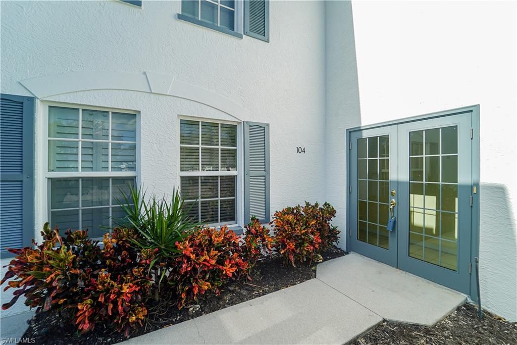 Photo of 841 Tanbark DR #104, NAPLES, FL 34108 (MLS # 223052688)