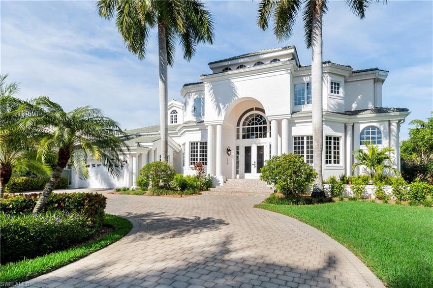 One of the most desirable addresses in Naples, this beautiful 2-story home is perfectly nestled in a small private gated community on historic Gordon Drive. With a private walkway to the beach, enjoy golden sunsets and sandy beaches just steps from your front door. Upon entering, one is greeted with large picture windows and soaring ceilings, a view of the stunning backyard, a large open floor plan with a first-floor master suite, beautiful eat-in kitchen, and more. The kitchen boasts stainless appliances, granite countertops, dark wood cabinets and a breakfast nook. The covered lanai features an outdoor kitchen with built-in grill and room for al fresco dining. The custom shaped pool and spa is surrounded by impeccably manicured landscaping which offers privacy and serenity. The second floor contains one master suite and two additional bedrooms that are spacious with plenty of closet space and has an abundance of windows allowing for lots of natural light. The home has been freshly painted and has all new carpets in the bedrooms. In 2015, the home was updated with all new cabinetry, new granite, and hardwood flooring.