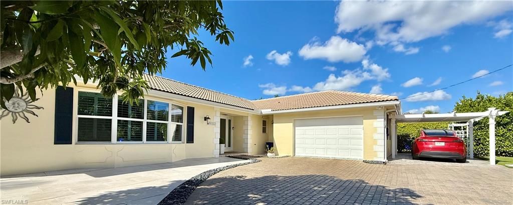 Photo of 2120 Sandpiper ST, NAPLES, FL 34102 (MLS # 226001019)