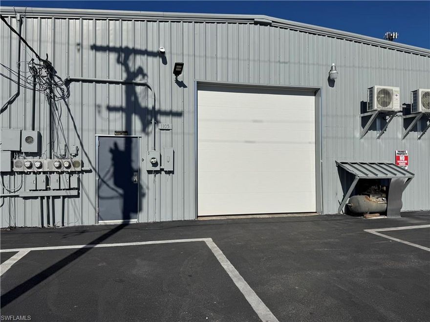 Large middle unit - Vault D - ready for occupancy. 40' x 50' x 17'+/- unit with ADA bathroom, lots of power ceiling drops as well as air drops. Compressor for air included.  Zoned light industrial, but a perfect man cave.