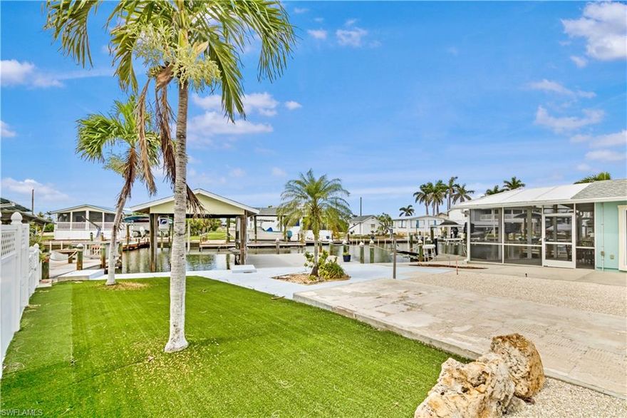 We are proud to present a rare slice of paradise in St. James City on Pine Island – a 42' x 89' waterfront lot perfectly positioned on a deep, direct Gulf-access canal with no bridges. With 42 feet of seawall and a private covered 8,000 lb boat lift, this property is a dream come true for boaters, anglers, and anyone looking to live the laid-back, tropical lifestyle Pine Island is famous for. Whether you're chasing tarpon in the world-renowned local tournaments or cruising out to Sanibel, Captiva, or Cayo Costa, this location gives you instant access to some of the best waters in the country. The lot features a spacious composite patio dock, perfect for enjoying the sunset, entertaining guests, or simply relaxing by the water with your feet up. An astro-turfed section adds a clean and low-maintenance area that's ideal for pets or outdoor lounging. Flexibility is the name of the game here: use the lot as an RV getaway, build a new mobile home, or construct a conventional stilted island home – the possibilities are endless. Whether you're a weekend warrior or a full-time islander in the making, this property fits the bill. Looking for more space or a bundled deal? This lot is available alone or can be purchased as a package with the neighboring renovated home at 3820 Coconut Dr for a discounted price. It's a rare opportunity to own a piece of prime waterfront real estate and potentially expand your footprint. Pine Island offers a unique blend of small-town charm, vibrant artist communities, and some of the best fishing and boating in the world. With miles of mangrove shoreline, endless backwaters, and quick access to open Gulf waters, you'll find peace, adventure, and natural beauty all in one place. Don't miss your chance to secure this waterfront gem – whether you're ready to build, park your RV, or invest in a lifestyle many only dream of. The sunsets, the snook, and the salty breeze are calling.