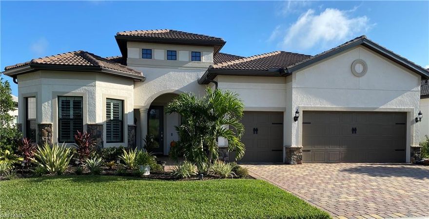 Popular Pinnacle model with GOLF COURSE VIEW at GREYHAWK AT GOLF CLUB OF THE EVERGLADES. This spacious home is bright and airy with volume ceilings, large island in the kitchen overlooking the living room, dining room and open 20' extended lanai. Zero corner impact rated sliding doors enhance the open feel. Crown molding, custom window casings and custom wood wall trim line the foyer and rear den wall.  Plank style 12x24" tile flooring runs throughout the home.  The kitchen features white cabinets, wine refrigerator, wine rack, pull out drawers, walk-in pantry, 5 burner gas cook top with decorative vent, tile backsplash and quartz counters. The expansive owner's closet has custom shelves, drawers and floor-to-ceiling shoe rack.  All windows and doors are impact glass. The outdoor living space is enhanced with extensive landscape, brick paver walkway and outdoor lighting that is so peaceful at night! Residents enjoy use of 2 club facilities, a resort amenity center with full service dining, bar, tennis, bocce, fitness center, and pool, along with a social membership at the Everglades Golf Club w/limited play.  Full golf membership available as well. P.S. The neighbors are great!