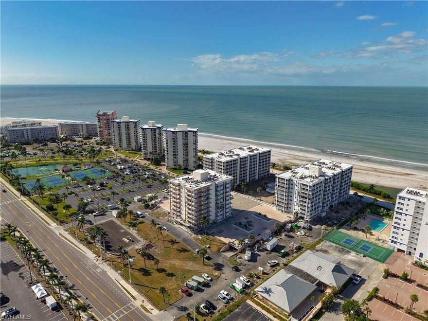 Experience breathtaking Gulf-front living in this stunning corner condo on sunny Fort Myers Beach, perfectly positioned along the sparkling Gulf water. Boasting an expansive wrap-around balcony where the front slider retract back all the way back.  You will enjoy view of the turquoise waters, sugar white sands, and vibrant sunsets.  Ideal for morning coffee or evening beverages with the sea breeze.
Step inside to an open-concept living and kitchen area designed for seamless flow and modern coastal elegance.  The spacious layout maximizes natural light and Gulf vistas.  The gourmet kitchen features plenty of counter space, granite surfaces and island seating perfect for entertaining.
Both bathrooms have been remodeled with a contemporary style and bedrooms open up to the extra large wraparound balcony. This condo also comes with a designated garage parking space to protect your vehicle from sun and rain.
This rare corner unit combines privacy, luxury and direct beach access in one of Fort Myers Beach most coveted locations.  Conveniently located to shops, grocery store and south end access to Lovers Key State park and miles of white sand to stroll upon.