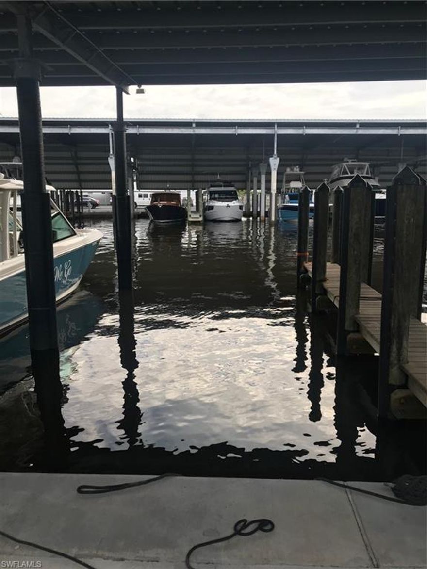 L.788 - COVERED boat slip in private gated marina located on the west side of Naples Bay.  Full time security to protect your investment. You actually own the land under your slip, not a submerged land lease.  Lot size 15'5 x 36' per the marina plat attached.
