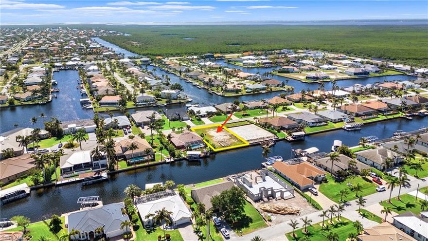 Gulf Access waterfront lot in a quiet cul-de-sac in beautiful Unit 74 off Beach Pkwy and Surfside. Build your dream home on this premium Gulf access lot, perfectly positioned in a quiet cul-de-sac in one of Cape Coral’s most desirable neighborhoods with many Million dollars homes. Located at 2815 SW 40th St, this boater’s paradise offers convenient, easily navigable access to the Gulf of Mexico and its stunning beaches, making it perfect for those who love life on the water. A BRAND-NEW SEAWALL has already been installed, providing a strong foundation for your future dock and boat lift. Plus, with CITY WATER AND SEWER ARE in place and ASSESSMENTS AND ARE FULLY PD. This lot is truly ready to BUILD…SAVING YOU TIME & MONEY! Surrounded by upscale waterfront homes and just minutes from shopping, dining, and entertainment, this location offers the perfect balance of privacy, luxury, and convenience. Whether you’re planning your forever home or investing in prime real estate, this build-ready Gulf access lot is an incredible opportunity. Don’t miss your chance to own a slice of paradise, go see it and call today for more details! WE HAVE SEVERAL BUILDERS WITH MULTIPLE FLOOR PLANS AND ARE READY TO BUILD YOUR DREAM HOME !!