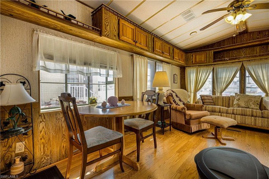 Welcome to the beautiful community of Imperial Wilderness, a gated 55+ community where you own the land.  This lovely place is close to the office and the clubhouse heated pool/hot tub.  This is a community where everyone says hello and watches out for each other. There is always something to do, plenty of places to walk or ride bikes, a dog park, workout room, library and so much more.  This cute place has been well taken care of and has a lovely grassy area in the back as well as a patio.  It is only about 3 miles to Walmart, CVS, Walgreens, Publix, Lowes, and more.  It is about 8 miles to Marco Island and about 12 to beautiful downtown Naples.  There is a boat launch about 5 miles away.  Come on down and enjoy the sunshine and the warm weather!