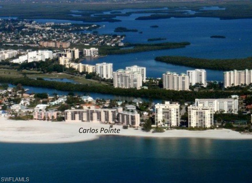 Don't miss this opportunity to own a direct beachfront UPDATED CORNER Carlos Pointe unit and that is also a GREAT INCOME PRODUCING property.  The unit had over $32,000 in 2014 income plus over $18,800 in confirmed 2015 bookings already in place!  The corner units have a large lanai and this lanai was newly tiled in 2013.  The unit was updated in 2008 with granite countertops, diagonally tiled floors, new kitchen and new bathrooms.  2013 updates include:  hot water heater; patio furniture; couch and sleeper sofa; wind rated sliding doors (2 sets); floor tile on lanai; screening on lanai; dinning chairs, lamps, cocktail table and side table; kitchen dishes and kitchen odds and ends.  This is a great split floor plan and each bedroom has an en-suite full bath.  The unit interior was also painted in 2013.  Storm shutters are on all windows and the lanai.  The HVAC system is newer.  Don't miss this!!