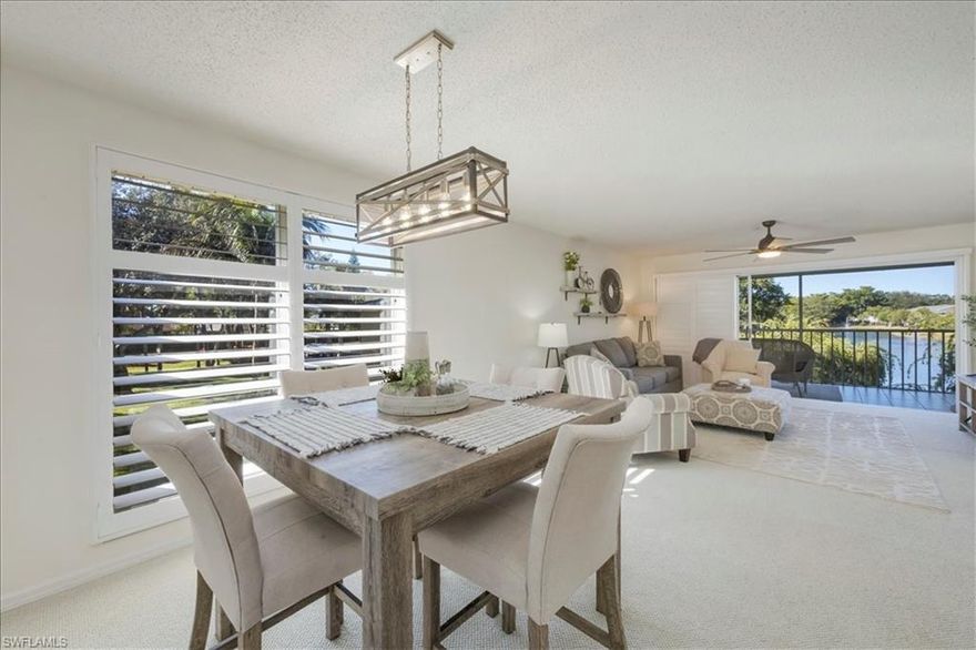What a view! This highly sought-after second-floor end unit is filled with natural light from large side windows and offers breathtaking western sunset views. From the moment you arrive, this exceptional remodeled 2-bedroom, 2-bath residence with an additional dinette area off the kitchen—currently used as a den—will impress.

The open floor plan creates a bright, airy atmosphere throughout. The kitchen is truly a chef’s delight, featuring stunning soapstone countertops, a beautifully designed tile backsplash, a double-sided farmhouse sink, white Whirlpool appliances, and classic shaker cabinetry.

Thoughtful upgrades continue throughout the home, including new shaker-style interior doors, plantation bifold doors in the laundry room, and elegant plantation shutters that add both style and comfort. The spacious primary suite (11’6” x 13’6”) offers a peaceful retreat with a striking board-and-batten accent wall. The ensuite bath features a charming barn door entry, a new vanity and commode, and a large walk-in closet with a pull-down retractable ladder for additional attic storage. The guest bathroom has also been updated with a designer vanity, lighting, and fixtures.

Additional highlights include a freshly painted interior, new Berber carpet, recessed lighting, and all-new ceiling fans. Step outside to your oversized lanai, complete with extra storage and stunning western exposure—perfect for enjoying your favorite beverage while taking in unforgettable sunsets.

Abbey on the Lake has seen many recent improvements, including new roofs in 2022, a resurfaced parking lot in 2024, and exterior painting completed in January 2025. The community features a heated pool overlooking the lake, creating a tranquil setting to relax and unwind.

Located within Imperial Golf Estates, residents enjoy a gated community with a convenient back entrance off Livingston Road. Optional memberships are available, NOT REQUIRED,offering access to two 18-hole golf courses and a variety of social or family amenities. Just a short drive away are Naples’ world-famous white sandy beaches and Bonita Springs, including the iconic Doc’ Beach House.

Enjoy tradition walks in the community and neighboring community, a figure 8 loop, everyone is out and about.  Pets are alllowed 1 Dog or Cat, see rules for specifications. 

Bring your family, settle in, and start making beautiful new memories today!