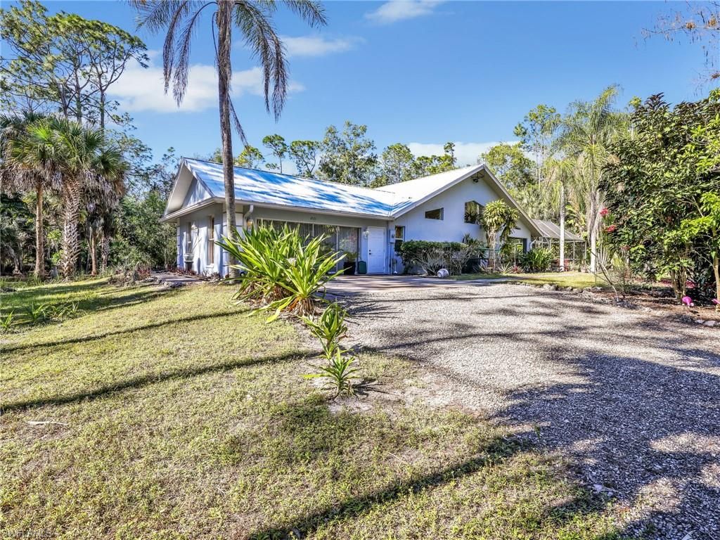 Photo of 4521 3rd AVE NW, NAPLES, FL 34119 (MLS # 225080395)