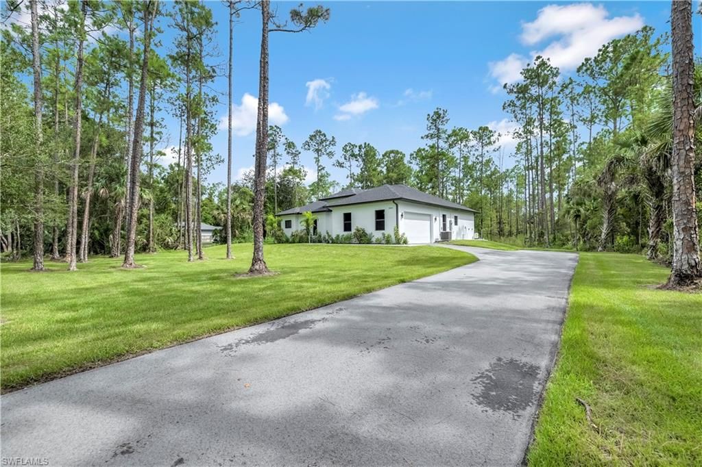 Photo of 1968 18th AVE NE, NAPLES, FL 34120 (MLS # 226020946)