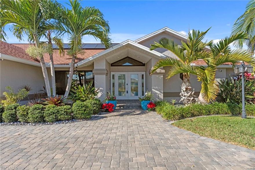 All I have to say is this is THE ONE! Seller open to Concessions! You need to see this Lake Alhambra lakefront property as soon as possible! From the moment you drive up to the home you will notice the beautifully presented landscaping and large circular sealed paver driveway, PERFECT for entertaining. The home is incredibly welcoming and you will not want to leave once you are there! Step inside to see the beautiful views from all angles, the spacious 3 Bedroom/ 
2 Bathroom (2nd bathroom with pool access) heated pool and above ground hot tub home is completely remodeled from top to bottom. Notable upgrades include large remodeled kitchen with waterfall granite countertop and a built in table for gathering, kitchen cabinets and drawers, all newer stainless kitchen appliances, and a bonus refrigerator in the laundry room. Completely remodeled bathrooms with gorgeous showers and seamless glass doors, large diagonal tile throughout, light and bright, soaring ceilings, walk-in-closets with plenty of storage space, and fresh paint, and this is ONLY the inside of the home! The outside of the home is just as incredible offering NEW ROOF 2020, new flat roof section above the lanai, Solar Panels that power the whole home (COMPLETELY PAID OFF), FULL Hurricane Protection with Impact Windows/Doors and Shutters, and the property has been fully updated for wind mitigation, saving the homeowner over $2500 year on insurance. PLUS NO FLOOD ZONE, Meaning NO FLOOD REQUIRED! WOW! Out back you will notice the FULLY FENCED YARD, stunning paved Captain's Walk, composite wood boat dock and 10,000 lb lift. Last, but not least are the finishing touches of the home; oversized garage with NEW garage door opener, built-in storage, and a mini-split AC for those hot summer days! A whole-house water conditioning system, surge protection, wired for a generator, and SO MUCH MORE that you have to see for yourself! Book your showing TODAY and DO NOT MISS the ATTACHED 3D Tour (some furniture in pictures used for virtual staging purposes).