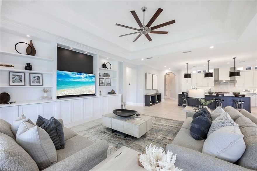 Luxurious 2nd floor “Sienna model” coach home located in the Corsica subdivision of Talis Park. 3,382 sq ft under air includes 3 bedrooms plus den/flex space, 3 full ensuite bathrooms and powder room. An intimate outdoor courtyard welcomes you into the impressive foyer with soaring ceilings, private elevator and custom finished staircase. Boutique Hotel inspired decor with furnishings negotiable. Livable luxury that draws influence from natural surroundings, organic fibers and layered textiles. Upgraded chef’s kitchen with an expansive island, 6 burner gas range plus griddle, double oven, wine and beverage coolers, built in fridge and freezer and walk in pantry. Separate wet bar the perfect spot for your morning coffee, midday smoothies and evening cocktails! The primary suite includes double sinks, sit down vanity, and spectacular double custom walk-in closets. 10 impact glass slider windows and doors lead to an expansive lanai area that let in lots of natural light with southern exposure. Attached private 2 car garage with epoxy flooring. Located in North Naples Talis Park offers an award winning recently renovated golf course designed by Greg Norman and Pete Dye.