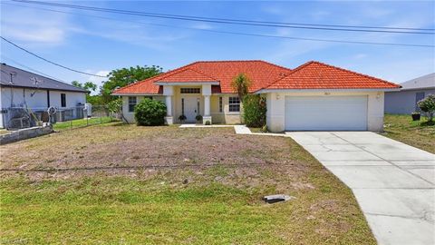 Photo of 1011 Chadbourne AVE, LEHIGH ACRES, FL 33971 (MLS # 226019443)