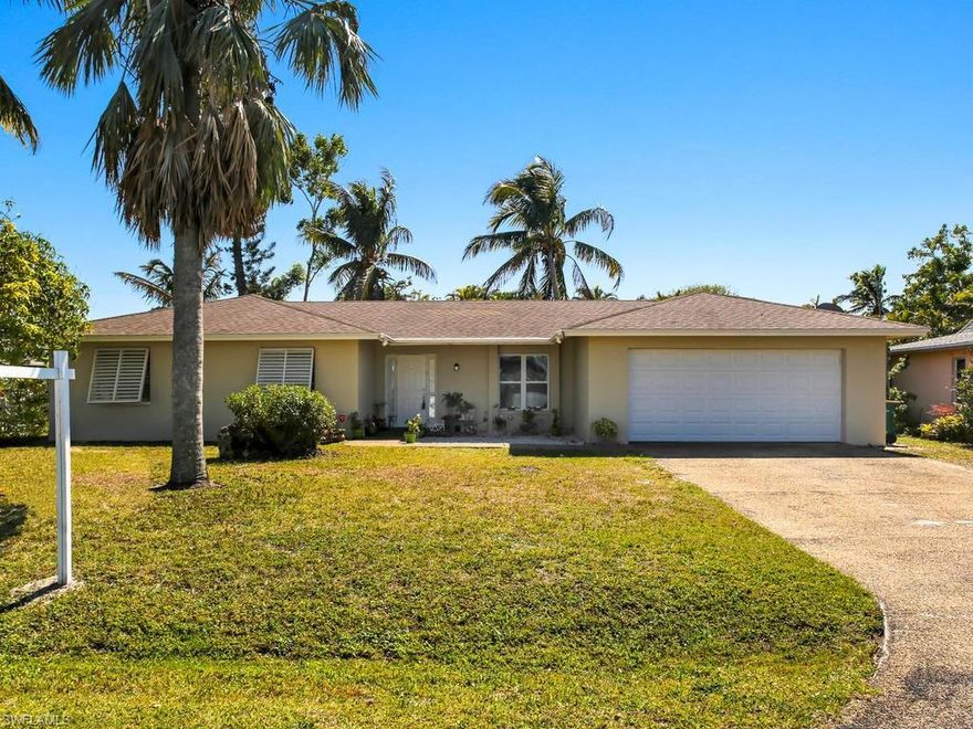 What a great location! This gorgeous home is located only 10 minutes from I75 and downtown Naples. Must see, this 3 Bed/2 Bath family house with a 2-car garage. The outdoor space is great for entertaining. Enjoy the screened lanai and fenced yard. Kitchen offers nice stainless-steel appliances and upgraded backslash. Call today for your private showing of this well priced home with NO HOA FEES. Visit the video tour for a spectacular view of this property.