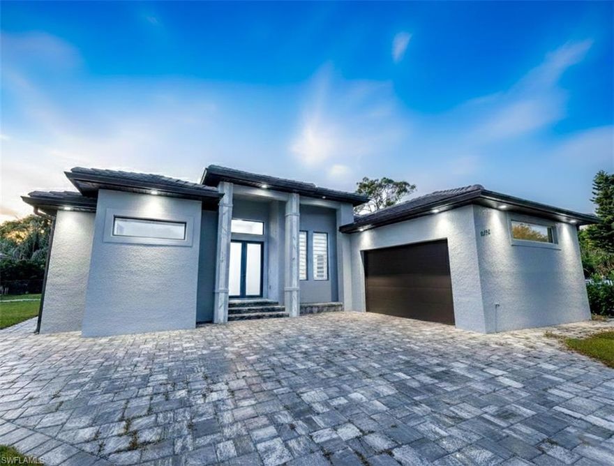 Welcome to this stunning HOME nestled on 0.64 acres, offering the perfect blend of style, comfort, and functionality. NO FLOOD ZONE. Inside, you’ll find elegant tile flooring throughout and a modern sophisticated color palette. The custom-designed kitchen features cabinetry, a coffee bar, and a dedicated entertaining bar area. His and hers walk in closets, modern blinds. Step outside to experience true Florida living. The expansive outdoor space includes a fully equipped outdoor kitchen, panoramic screened enclosure, and a beautiful 15x40 saltwater pool complete with an outdoor rinsing shower. Tiled garage with AC split offers multiple options, designated work space like office, gym, game room, kids playground etc, full bathroom for easy access. For added convenience, the property includes a tiled outdoor storage shed, plus an additional oversized shed ideal for boats, RVs, or extra storage. Enjoy the lush setting with fruit trees and abundant space to relax and savor the Florida lifestyle, fully fenced and gated for optimum privacy. DO NOT MISS THIS OPPORTUNITY.