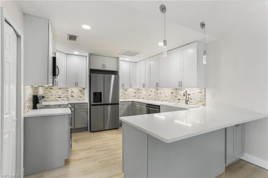 Just Reduced! Act fast on this completely renovated, super-chic, 2 bedroom, 2 bath Villa in the perfectly located Royal Woods community! This chef’s kitchen is loaded with high-end, brand-new appliances, brand-new shaker cabinets, farmhouse sink, and level 2 quartz countertops and a pantry. The master and guest bathrooms are finished beautifully with modern tile and lighted mirrors. All-in-one, space-saving washer/dryer unit is also brand new! Outside AC unit is brand new! Enjoy a tranquil outdoor private courtyard with your own palm trees for outdoor dining and entertaining. This unit is a short walk to the community clubhouse, tennis courts and community pool. Royal Woods is perfectly located with easy access to 41 and RSW airport. Don’t let this immaculate, modern home get away. Agents see remarks.