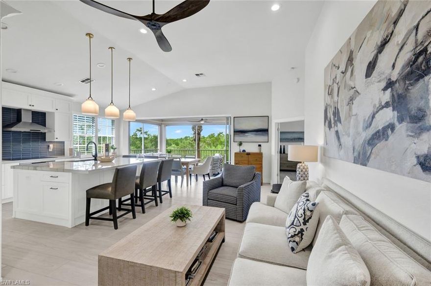 Experience refined coastal living in the prestigious community of Bonita Bay with this BEAUTIFULLY RENOVATED upper-level residence offering 3 bedrooms + den and 3 full baths, framed by tranquil preserve views and thoughtfully designed upgrades throughout. From the moment you enter, you’ll appreciate the bright, modern aesthetic featuring tile, wood-style flooring throughout, plantation shutters, and crisp white soft-close cabinetry that brings a clean coastal feel! Designed for effortless indoor-outdoor living, the home’s great room flows seamlessly to the screened lanai, making it a true extension of the main living space—perfect for relaxing, entertaining, and enjoying the peaceful preserve backdrop year-round. Added peace of mind comes with Storm Smart hurricane screens (2022), allowing you to comfortably enjoy this space all year long. The heart of the home is the stunning chef’s kitchen—ideal for gatherings and everyday living—complete with a large center island with wrap-around cabinetry, a built in wine cooler, and floor-to-ceiling cabinetry for exceptional storage. A premium Bosch appliance package, including refrigerator, microwave, oven, cooktop, microwave, and dishwasher, complete this beautifully appointed space. The spacious primary suite is a private retreat with direct access to the lanai, enhancing the home’s indoor-outdoor lifestyle. The spa-inspired primary bath features dual sinks and a walk-in shower. Guests will feel right at home in the inviting guest bedroom, enhanced by a custom wall accent and a private en-suite bath with a walk-in shower. Throughout the home, custom closets provide effortless organization and a polished finish. The versatile den is elevated by barn-style sliding doors and a custom floating media cabinet—a statement feature that blends style and function. Additional recent improvements include a new air-conditioning system (2022), enhancing both comfort and efficiency. Set within one of Southwest Florida’s most desirable communities, this exceptional residence delivers the perfect blend of luxury, privacy, and lifestyle. Bonita Bay offers an array of exceptional amenities, including a BRAND NEW private beach club, kayaking, canoeing, pickleball, tennis, and multiple community parks. Explore over 12 miles of walking and biking paths, or take advantage of the full-service marina and restaurant. Golf enthusiasts will appreciate the FIVE on-site courses, complemented by several dining options, a state-of-the-art fitness center, and more--all available with club membership (additional fees apply). Located just a short drive from world-class dining, shopping, beaches, and nature preserves, you'll also enjoy easy access to the burgeoning downtown Bonita Springs and downtown Naples. Plus, RSW International Airport is conveniently nearby! Don't miss out on this exceptional opportunity.