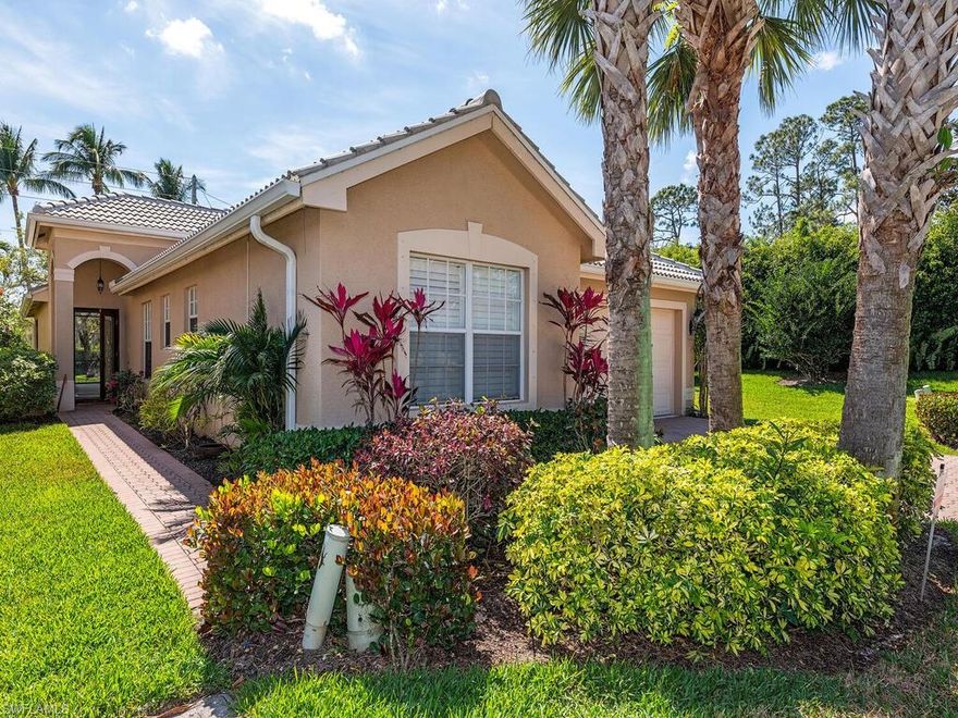 Immaculate home in sought after Saturnia Lakes- one of the most desired communities in North Naples with A Rated Schools. This beautiful and impeccably maintained 3 bedroom/2 full bathroom single family Cortina model sits at the end of a cul de sac with 1760 sq ft of living space. This home offers a new roof (2021)-updated kitchen with granite countertops and stainless steel appliances, Nest Thermostat, updated LED lighting throughout, plantation shutters, new hardware, spacious custom closets and an oversized corner lot with plenty of privacy and room for a pool as well as space to enjoy. Saturnia Lakes is a family friendly resort style community with renovated clubhouse and an extensive calendar of community events- 3 swimming pools- fitness center , sports and billiards room, 4 lighted Har-Tru Tennis Courts, children's playground- stunning Passive Park walking path and award winning landscaping design throughout the community, This home is a rare find and must see!