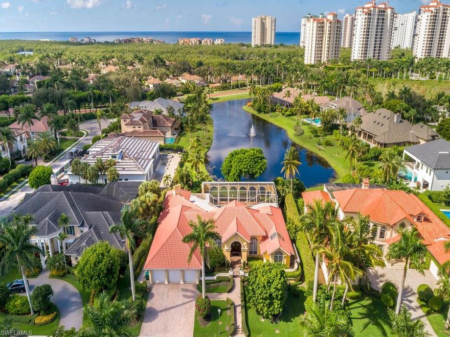 H.13536 - Fabulous opportunity to own a delightful one-level Florida Style Custom Estate Jewel proudly situated on the best 5-Star SW lakefront home site in prestigious Bay Colony Shores. Smashing step down Grand Salon showcases mitered glass & clerestory SW window walls, open chef’s kitchen, family room with cathedral tongue-in-groove ceilings, sun room with palladian windows, and Master Suite with step-down sitting room, & ALL flow directly out to the outdoor experience. This home offers lots of unexpected extra pleasures, including whole-house generator, air-conditioned 3 car garage, hurricane wind screens, security system, marble & wood flooring, skylights, Wolfe gas range, central vac, aqualink pool/spa controls, & 12’ double entry solid hardwood main entry doors, just to name a few. Plus enjoy all the First-Class amenities via both your Bay Colony & Pelican Bay Membership privileges: 2½ miles of beach to call your own, 3 Gulf-Front Beach Clubs with open air casual & formal indoor dining, attended beach services, 3 tennis centers, state-of-the-art fitness, life-long learning center, canoeing, kayaking, & miles of walking, biking & nature paths.