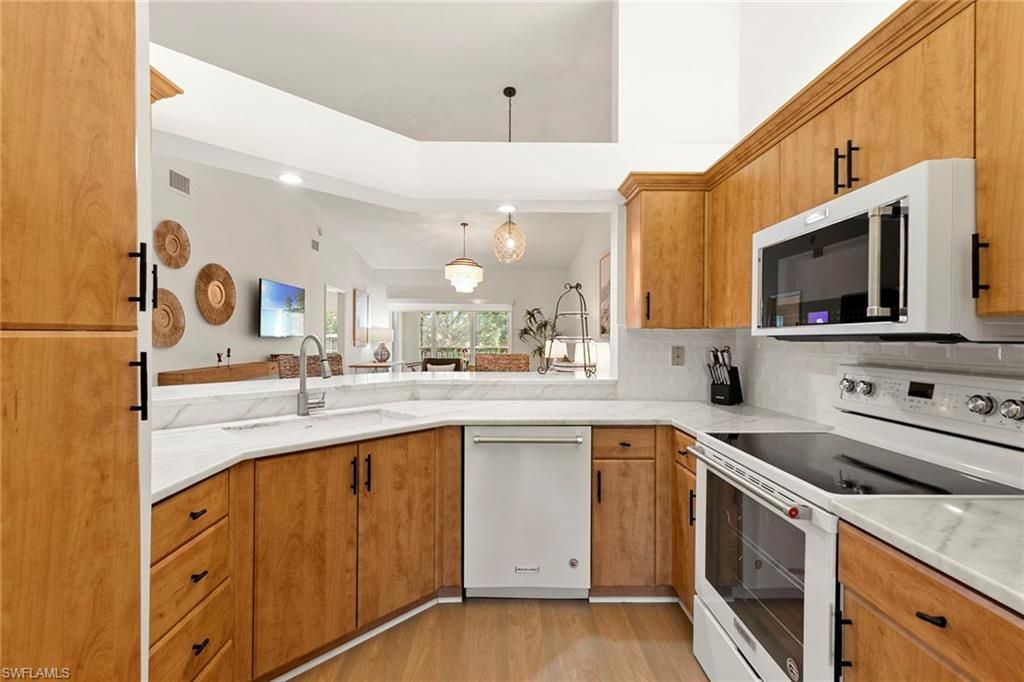 Photo of 841 Tanbark DR #202, NAPLES, FL 34108 (MLS # 225075927)