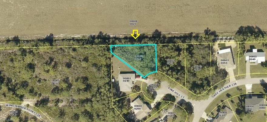 Quiet vacant residential lot in Pine Island Village community. Community Pool, and a half Basketball Court. This nice retreat is in a setback cul-de-sac. This lot is located on a County maintained road with water and electric hook up available at the street! Don't miss this opportunity to own your own homesite on tropical Pine Island.