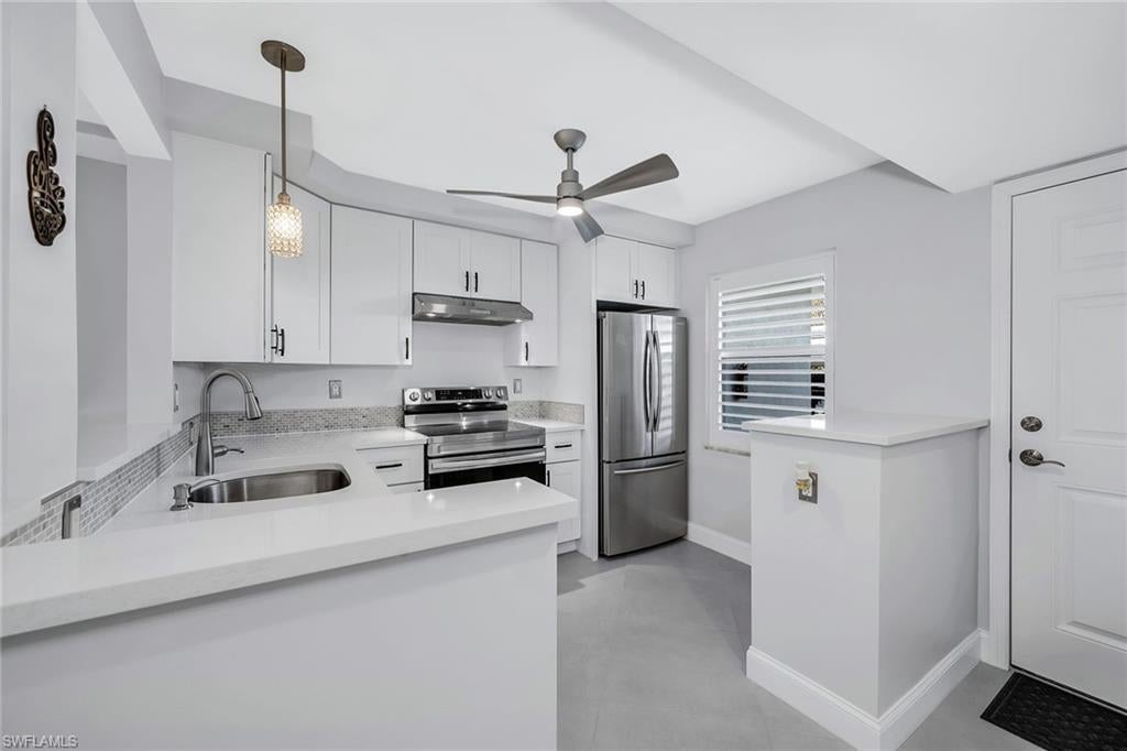 Photo of 3055 Riviera DR #102, NAPLES, FL 34103 (MLS # 226008615)
