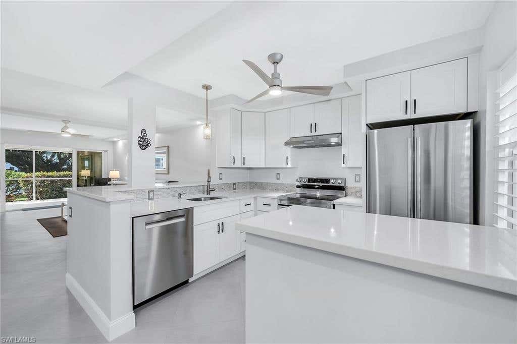 Photo of 3055 Riviera DR #102, NAPLES, FL 34103 (MLS # 226008615)