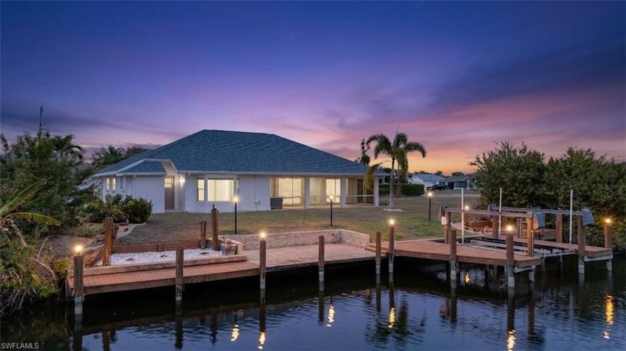MOTIVATED SELLERS - UP TO $15,000 IN CLOSING COST CREDIT - HOME WARRANTY - GULF ACCESS + BOAT LIFT - MOVE-IN READY WATERFRONT.

Boater’s dream in one of Southwest Cape Coral’s most desirable Gulf access locations. This Gulf access home features updated systems and true Florida waterfront living, complete with a private dock and boat lift for convenient access to open water. The freshly painted dock is ready for your boat.

Big-ticket improvements provide confidence with NEW ROOF (2026), NEW EXTERIOR PAINT (2026), HURRICANE IMPACT WINDOWS (2023), NEW PLUMBING THROUGHOUT (2022), AND A/C REPLACED (2020). Irrigation system recently updated. The home is equipped with a 200 amp panel in the garage, allowing for easy EV charger installation. Low flood insurance only $183/month.

Inside, the home features a bright, updated interior with modern finishes throughout. The spacious primary suite includes a walk-in closet and a beautifully designed bathroom featuring a standalone soaking tub, creating a relaxing private retreat.

Step outside and enjoy the peaceful canal setting with plenty of space to relax or entertain. The property also offers room to add a future pool, giving the next owner the opportunity to create their own backyard oasis.

A rare bonus for this area - vacant lots on both sides provide additional privacy and a more open feel compared to neighboring homes.

Located near Surfside Blvd and Veterans Pkwy, this home offers convenient access to shopping, dining, and some of Cape Coral’s best boating waters.