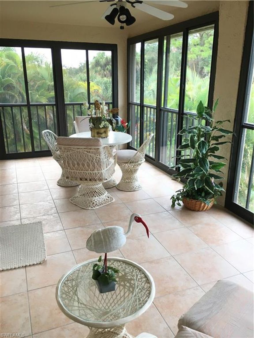 Yachtsman's Cove Condos at Riverbend- Introducing 15371 Transit Ct #705.  Located in the newest and what many say is one of the most desirable buildings in the complex, this spacious 2nd Floor END UNIT is extremely light and bright with a long view down the scenic navigable canal.  The condo was well maintained by one owner since it was built. It is very clean and the white berber carpet was just shampooed and looks almost as good as new.  It is ready for you to move right in,  or have a fresh neutral new palate to start your own decorating   The condo is offered partially furnished as shown and has quite a bit of the necessary furniture!  The kitchen features a pantry, an island, and a breakfast bar.  The great room has a full dining area and a very large living room that flows right into the Florida room.   The Florida room has decorator tile,  screens & custom glass sliders so you can enjoy outdoor living and tropical breezes through the screens, and then beat the inclement weather with you glass sliders closed.  This condo has it own parking space in the detached car port, a private storage closet, and USE of the community pools and dock for your boat