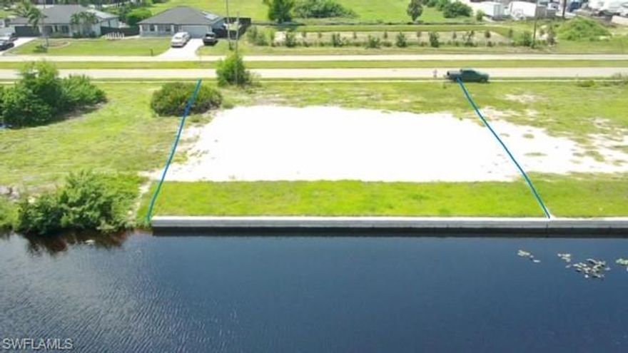 Beautiful lot on fresh water canal with BRAND NEW 2023 SEAWALL just finished! Ready for your new home to be built! Come enjoy fishing, kayaking, and boating!