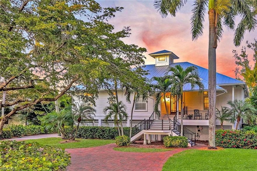 Welcome home to the coveted community of Hendry Creek! Set on a private cul-de-sac, 15499 Thory Court is a waterfront estate offering an exceptional blend of refined Florida design, privacy, and direct Gulf access - just minutes to open water. Positioned on an expansive .69-acre homesite, this home is thoughtfully designed for those who value exceptional indoor/outdoor living, boating convenience, and a truly elevated Southwest Florida lifestyle. Inside, bright, open-flowing interiors showcases beautiful Florida-style architecture enhanced by elegant wood and tile flooring throughout. The great room showcases custom built-in cabinetry and french doors to the outdoor living area - creating a welcoming space for entertaining and everyday living. The spacious primary suite provides a serene private retreat, complete with an en-suite bath and direct access to the outdoor living area. Two additional guest suites provide comfort and privacy for family and visitors alike. An expansive finished lower level offers a flexible living space ideal for recreation, a media room, guest quarters, or extended-stay accommodations, while a dedicated private fitness room supports a wellness-focused lifestyle. A secure safe room adds peace of mind with protected storage. The estate is equally impressive behind the scenes, featuring a reverse osmosis drinking water system and a whole-home water filtration system. Outdoors, lush, mature tropical landscaping surrounds the residence, creating a serene, private oasis. The elevated pool deck is thoughtfully designed with ample space for for both entertaining and relaxation.  Boating enthusiasts will appreciate the home’s private waterfront amenities, including a covered boat dock and lift with direct Gulf access, offering effortless trips to Estero Bay and beyond. Additional features include a durable metal roof, circular driveway, and an oversized two-car garage and workshop space - ideal for projects, tools, or hobbies. Residents of Hendry Creek enjoy access to community amenities such as a private community dock, fishing pier, and tennis and pickleball courts, all while being just minutes from the beaches, dining, shopping, and entertainment of Fort Myers. Meticulously updated and exceptionally maintained, 15499 Thory Court is a rare opportunity to own a luxury Gulf-access home in Fort Myers, offering privacy, space, and a lifestyle where boating dreams and refined Florida living come together effortlessly.