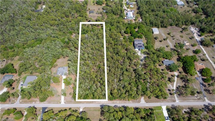 An exceptional opportunity to own 2.81 acres of untouched beauty in Golden Gate Estates, perfectly positioned for those looking to build a custom dream home in one of Naples’ most desirable and rapidly growing areas. Located north of Immokalee Road off Wilson Blvd N, this expansive homesite offers the ideal blend of privacy, space, and convenience, giving you the freedom to create your own private retreat while still being just minutes from everyday essentials and luxury amenities.

Surrounded by natural Florida landscape and serene surroundings, this property provides endless possibilities for a custom estate, guest house, workshop, or additional outbuildings with plenty of room for outdoor living spaces, a pool, or even space for recreational vehicles and hobbies. With no HOA restrictions, you have the flexibility to design and build exactly what fits your lifestyle.

Enjoy the best of both worlds with peaceful, estate-style living while remaining close to Naples’ top-rated restaurants, shopping destinations, golf courses, and entertainment, including easy access to Immokalee Road, I-75, and the beautiful Gulf beaches. Whether you’re a homeowner ready to build your forever home or an investor looking for land in a high-demand location, this property presents a rare chance to secure acreage in the heart of Naples’ growth corridor.

If you’ve been searching for the perfect canvas to bring your vision to life, this 2.81-acre Golden Gate Estates lot offers the space, location, and opportunity to make it a reality.