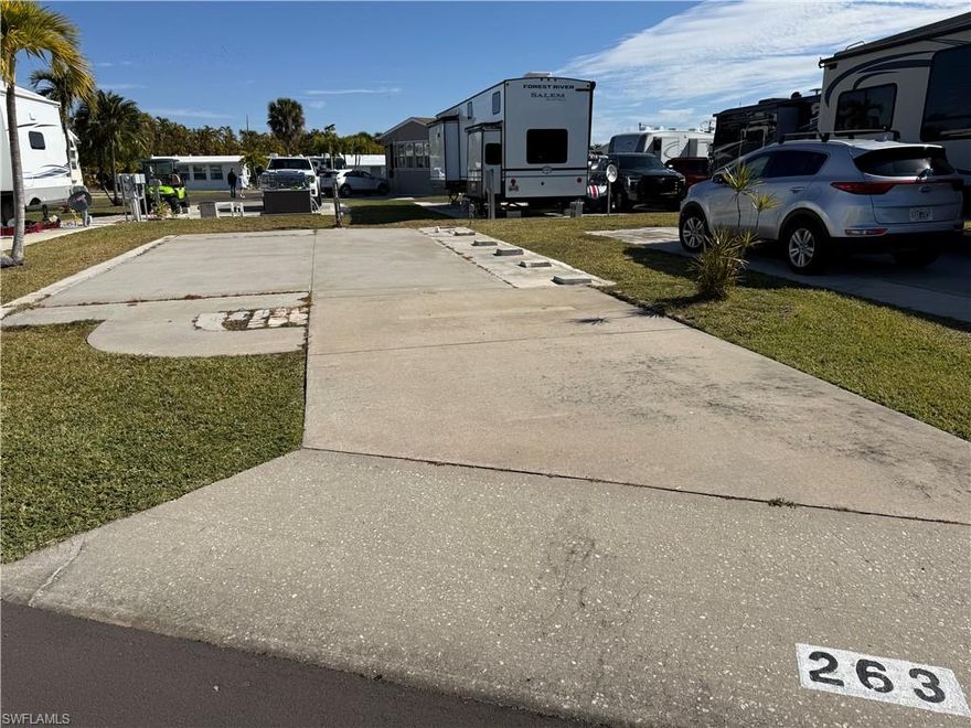 Welcome to Palmetto Palms where YOU own the land. This beautiful lot is ready for a camper, RV, fifth wheel, park model, or manufactured home. This lot is in the non-pet section of a 55+ community that offers tennis, pickle ball, horseshoes, volleyball, shuffleboard, two community pools, and a number of community activities. Palmetto Palms is located between Sanibel Island and Fort Myers Beach, and just 1 mile from Bunche Beach where you can watch sunsets, pick shells, fish, and even rent kayaks. Located close to restaurants, pubs, shopping, and groceries. Golf carts welcome! Welcome to endless Summer.