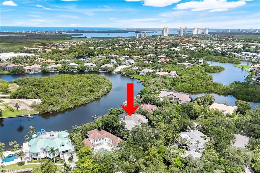 This breathtaking UPDATED single family estate home, with GULF ACCESS in the esteemed neighborhood of Hidden Harbor in Bonita Bay is one of true distinction. This home is an exceptional masterpiece, situated alongside the Imperial River with  pristine waterfront & preserve views, leading directly to Estero Bay & the Gulf. This home boasts many large spaces for family & friends to gather & an equal amount of intimate & private spaces where guests can relax & rejuvenate. Located on a peaceful cul-de-sac, this home offers the ultimate in luxury waterfront living. The distinctive design is complemented by panoramic water views from nearly every room, creating a serene & captivating atmosphere. The grand entrance is only the beginning - drive over a private bridge leading to the perfectly landscaped front yard, & into your 3-car oversized garage. The impressive entryway with gorgeous, brand new solid wood & glass doors, leads you into a home that is truly spectacular! It all begins with the stairway which is a masterpiece unto itself. The front room offers an area with sliding corner meet door & a place to enjoy a cocktail with a spectacular view before moving to the formal dining area for dinner. Just off the formal living space is the grand primary suite with ample closet space & a beautiful en suite bathroom. The newly renovated kitchen boasts Bosch & Miele appliances with a large center island & a casual space for meals. The full custom outdoor kitchen, recently renovated, is located just off the family room overlooking the Imperial River. Alongside the kitchen is a cozy family room & a guest bedroom suite tucked privately away from the rest of the home. Refined living is highlighted with added features such as a large game room just off the family room, multiple entry points to the outdoor kitchen, the pool & lanai, & a newly painted boat dock/lift. Even the pool & spa boast river views! The 2nd floor guest suites, adjoined by a comfortable living space, provide views of the waterways. With direct Gulf access, this home is the ultimate sanctuary for those seeking both elegance & effortless access to the natural beauty of Southwest Florida. Extra features include an elevator for 2nd floor access, all new landscaping, a charming gazebo, a wine cellar and so much MORE!  Bonita Bay offers an array of amenities, - a private beach club, kayaking, canoeing, pickleball, tennis, & multiple community parks. Explore over 12 miles of walking and biking paths, enjoy the full-service marina & restaurant. Golf enthusiasts appreciate the 5 courses, complemented by several dining options, a state-of-the-art fitness center, & more—all available with club membership (addl fees apply). Just a short drive from world-class dining, shopping, beaches & nature preserves, enjoy easy access to the burgeoning downtown Bonita Springs & downtown Naples. RSW Intl Airport is nearby! This is a once in a lifetime opportunity to own one of Bonita Bay’s most exceptional properties.