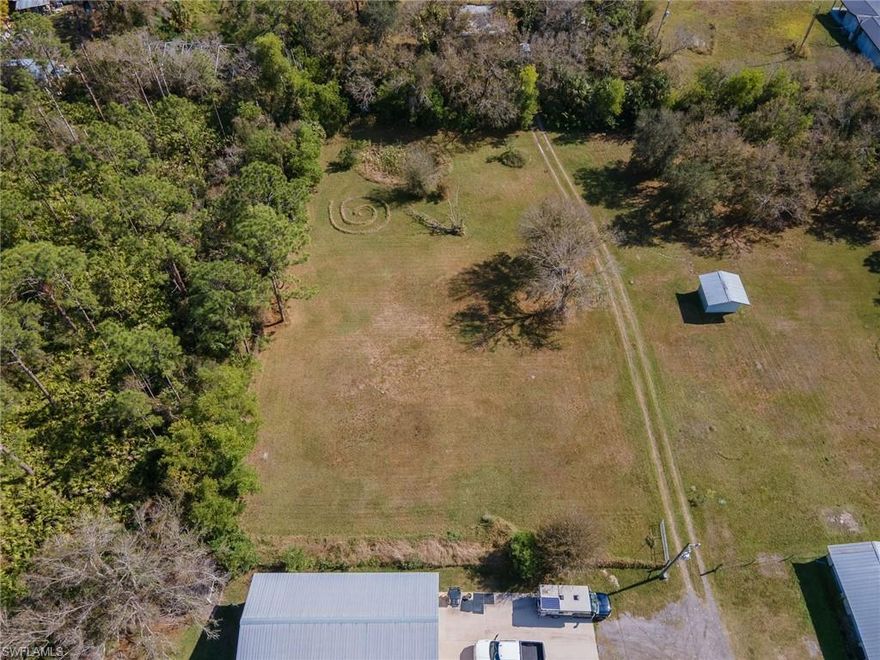 Almost an acre of land mostly cleared ready for you to build your dream home! Close to I 75, Grocery stores, restaurants and shopping! But set in a private setting. Additional lot available making it close to 2 acres! MLS number 225016997 Address 17440 Wells Rd Appointment required. Do not walk property without a licensed agent Must see!