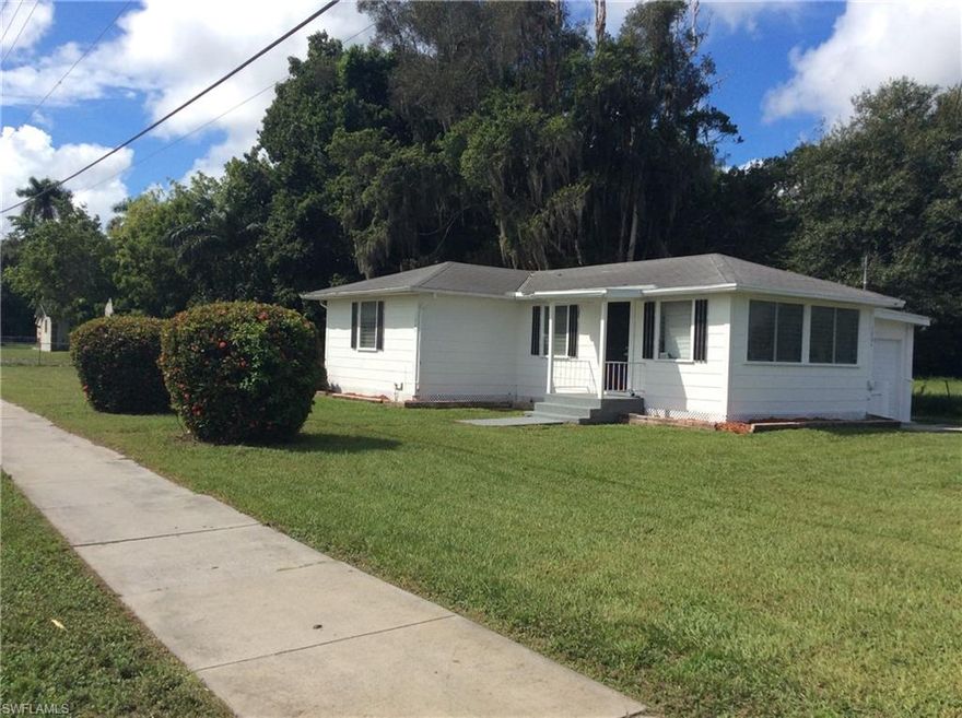 HOME COMPLETELY REFURBISHED ON A CORNER LOT.  !!  2/1 (POSSIBLE 3RD BEDROOM OFF THE GARAGE THAT HAS A DUCT FOR THE A/C WITH A BATHROOM THAT IS PIPED, NEEDS FIXTURES)  
NEW NEW NEW:  ALL DOORS, KITCHEN CABINETS, FAN & ALL LIGHT FIXTURES, LAMINATE FLOORS, AND A NEW AIR CONDITIONER!!!!  HOME HAS BEEN COMPLETELY PAINTED INSIDE & OUT.
ROOF IS 10 YEARS OLD.  THIS HOME IS READY FOR A FAMILY TO LIVE IN IT.
MAKE YOUR APPOINTMENT TODAY!!