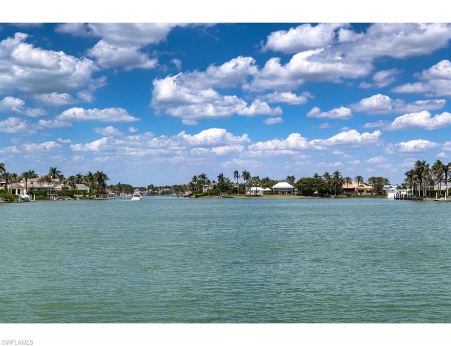 A rare Port Royal opportunity with exceptional long water views! Situated on one of the most desirable interior waterfront lots in all of Port Royal, this oversized property boasts approximately 154 feet of water frontage along Man of War Cove, paired with approximately 215 feet of road frontage (dimensions per plat and/or deed). This unique combination provides an expansive building envelope, allowing for an impressive street presence and the ability to design multiple shore-parallel rooms that capture sweeping water views. The property’s prime location offers quick and easy access to the Gulf via Gordon Pass, as well as nearby inland waterways—perfect for boating enthusiasts. The existing residence, filled with natural light and featuring high ceilings, is being sold in "As-Is" condition. Whether you envision a renovation or a custom new build, this is a once-in-a-generation opportunity to create a legacy estate with one of the finest long water views in Port Royal!