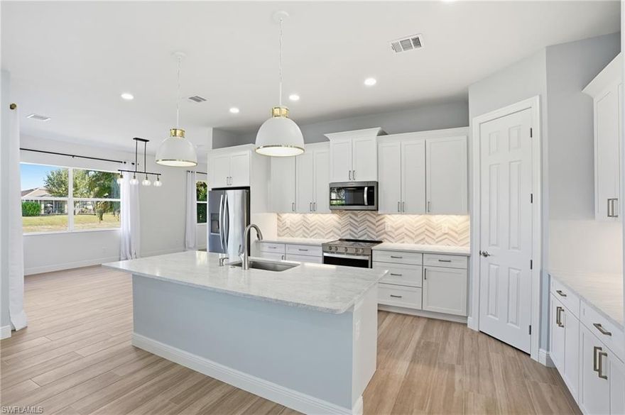 Completely remodeled from top to bottom, this stunning three-car garage, lake front home in Waterways of Naples offers the perfect blend of modern upgrades and prime location. Every detail has been thoughtfully updated, including a new A/C system, new water heater, and new ductwork for peace of mind and energy efficiency. Inside, you’ll find brand-new cabinetry with soft close doors, beautiful new plank tile flooring, and upgraded quartz countertops that create a fresh, contemporary feel throughout. Elegant eight-foot interior doors add to the home’s spacious and upscale design. The roof was replaced in 2018, providing additional value and security for years to come. Waterways of Naples is known for its exceptionally low HOA dues, all while being conveniently located near new restaurants, shopping, and everyday conveniences in one of Naples’ fastest-growing areas. This is a move-in-ready opportunity you won’t want to miss!