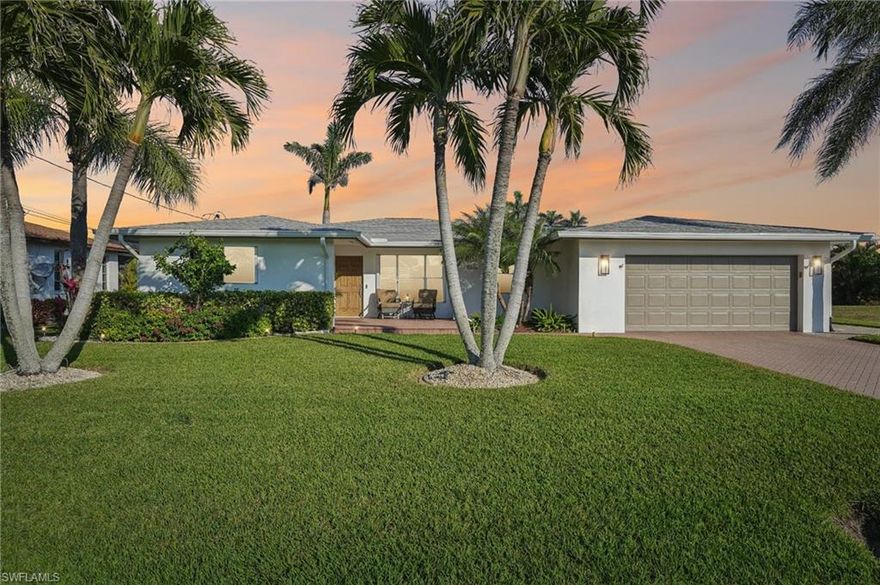 Sellers just had certified appraisal; home is now listed below market value! Highly motivated sellers moving out of state from this updated 2 BR PLUS DEN/OFFICE, 2 BA home offers true Florida living at its best with transferable insurance policy! Highly sought after Direct Gulf access Boating with “No Bridges” in SW Cape Coral! Just minutes to the Gulf of Mexico for fishing or shelling at the beaches. Newly updated features- stainless steel appliances, custom shaker cabinets, custom doors, custom trim, plantation shutters, and Perla QUARTZ countertops which features an oversized island for entertaining. Including sprinkler system & tropical landscaping w/brick-paver driveway. Walk into a light filled open, great room w/glass doors to view the oversized pool at 16X32ft and lounge under the large, covered space. This home is ideal for your perfect Florida boating lifestyle with all the activities and amazing views.  ROOF 2023, A/C 2018, Hot Water Tank 2023, Water softener system, New Portable GENERATOR 9500/12500 with 50 Amp cord hookup to installed transfer switch, accordion storm shutters, Boat Dock with 10k Boat Lift with wrap-around captain's dock with updated canopy and paver walkway right to your boat from the front door.