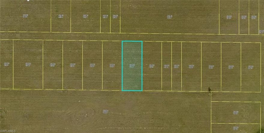 Small commercial lot located on the City dedicated parking lot