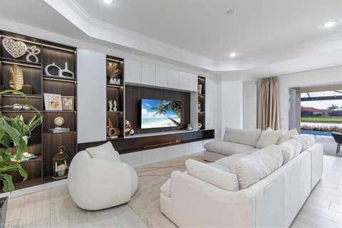 Photo of 18750 Lake Hammock DR, NAPLES, FL 34114 (MLS # 226028159)