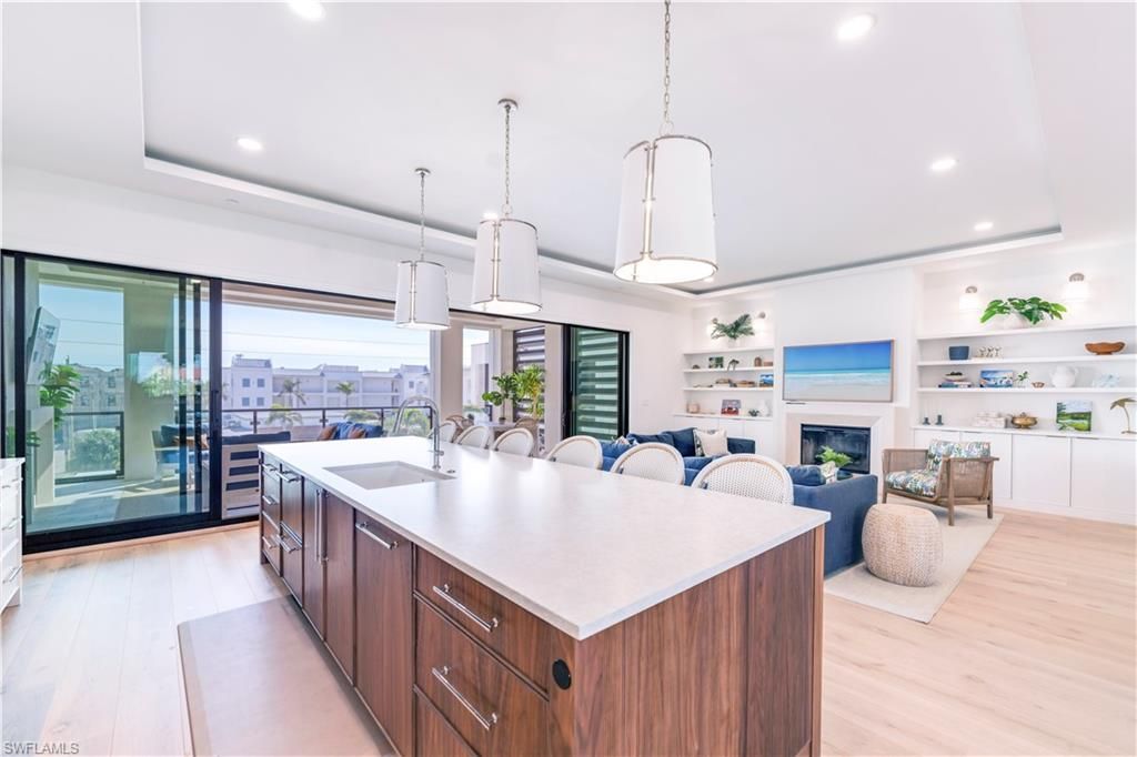 Photo of 82 9th ST S #303, NAPLES, FL 34102 (MLS # 225014876)