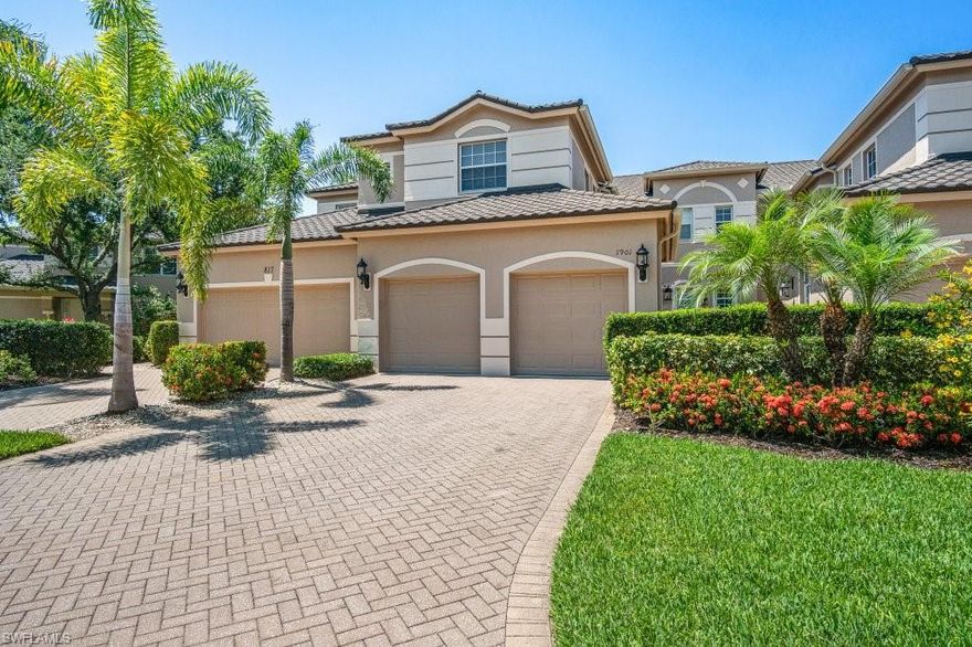 THIS HOME HAS IT ALL!  COMPLETELY UNIQUE & FULLY UPGRADED 2 BEDROOMS + LARGE DEN, 2 FULL BATHROOMS, ATTACHED 2 CAR GARAGE. Breathtaking Southwest Sunset Views over the long lake & fountains from inside your 350 sqft. completely enclosed Lanai with 160mph Hurricane Sliders and Screens. The exquisite Gourmet Kitchen includes Granite Counters & Backsplash, Stainless Steel Convection Oven & Appliances. Engineered Wood Flooring, Tile, Plantation Shutters & Crown Molding throughout. Custom Finished Closets. NEW Steel Roof & Gutters installed in 2021. Exterior Painted in 2022. New Oversized A/C and Washer & Dryer in 2018. This beautiful first floor coach home sits directly across the street from the amazing Regency Reserve Community Pools, Fitness Center & soon to be remodeled Clubhouse & Guest Parking. The Prestigious VINEYARDS is one of the most desirable communities in Naples & Southwest Florida. Golf & Social Memberships are OPTIONAL. Vineyards Country Club is one of the most remarkable, with TWO award-winning 18-hole championship golf courses set on 300-acres of unmatched experiences for golf, tennis, pickle ball, fine dining, social events & more. (AGENTS: See Remarks & Attachments)