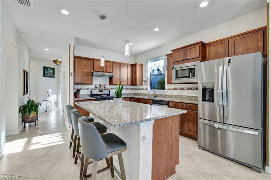 Nestled within the gated community of Manatee Cove, this 2022-built residence offers a refined blend of modern design and relaxed Florida living. Featuring 2 bedrooms plus a versatile den and 2 bathrooms, the home is thoughtfully designed to feel both open and inviting.
The light-filled interior showcases a seamless, open-concept layout anchored by a stylish kitchen with a center island—perfect for casual mornings, entertaining, and everything in between. With no carpet throughout, the home delivers a clean, contemporary feel and effortless maintenance.
Step outside to the extended screened patio, where peaceful lake views create the perfect backdrop for morning coffee or evening unwinding. Added exterior electrical outlets provide added convenience for seasonal décor and outdoor entertaining.
Complete with a 2-car garage and situated in a desirable natural gas community, residents also enjoy access to a community pool and fire pit area—ideal for gathering with neighbors and friends. Perfectly located just a short drive to Naples’ renowned beaches, Marco Island, and a wide array of shopping and dining, this home offers both serenity and accessibility.
A modern retreat in a sought-after setting—this is Florida living at its finest.