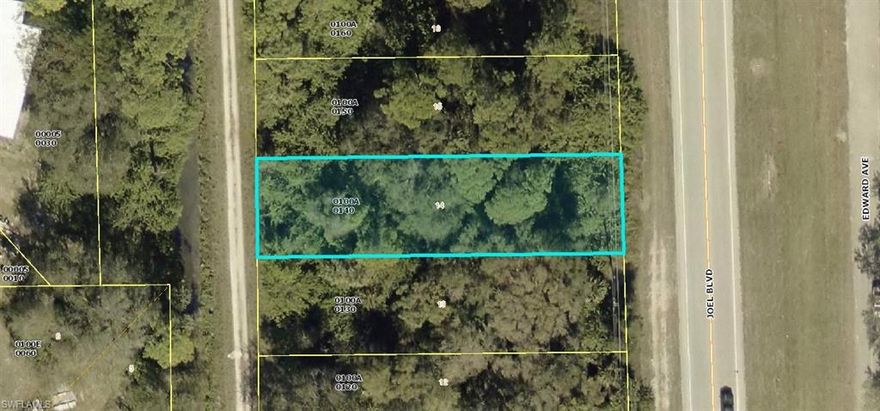 Great Commerical lot on busy Joel Blvd.  Buy now and build later and the area is growing quickly.  Zoned for many different commercial uses.