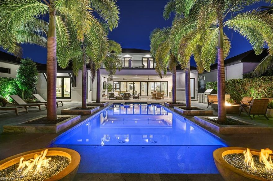 Resort-Style Luxury in The Landings at Bears Paw, Stunning- 4 Bedroom plus Den, 5 1/2 Bath, Custom Home with Gulf Access.
Welcome to The Landings at Bears Paw, Naples, hidden gem tucked between the Gordan River, Greenway Park, and the Jack Nicklaus Signature Bears Paw Golf Course. This stunning 2019-built custom two-story home by MHK Architect & Planning has impeccable finishes and details.  Designed for entertaining and Florida living at its best, the home boasts a Gourmet Kitchen, with Thermador Appliances, Custom Cabinetry, Large Quartzite Island & Full House Generator.
Three bedrooms are all-ensuite, providing privacy and luxury for family and guests. The media room is a showpiece with custom cabinetry, granite counters, and refrigerator drawers-perfect for movie nights, or hosting friends.
Step outside and enjoy your golf course views right from your expansive 1900 sf lanai, featuring a custom fireplace, fully equipped outdoor kitchen, resort-style pool with fire bowls and fire table, perfect for sunset cocktails or weekend gatherings. Plus, your private dock with boat slip offers direct access to the Gulf, for endless adventures.
Every detail has been thoughtfully curated for both function and flair, from spacious living areas to light filled interiors and elegant finishes throughout. This home combines recreation, relaxation, and luxury into one perfect package.