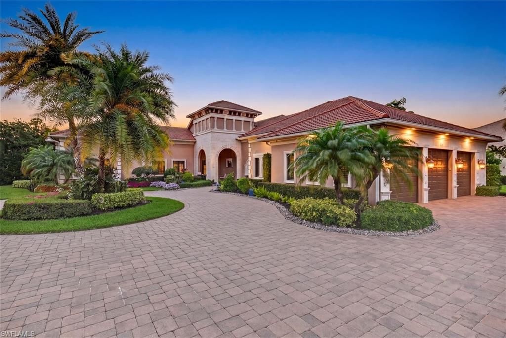 Photo of 628 VENEZIA GRANDE DR, NAPLES, FL 34119 (MLS # 226016841)