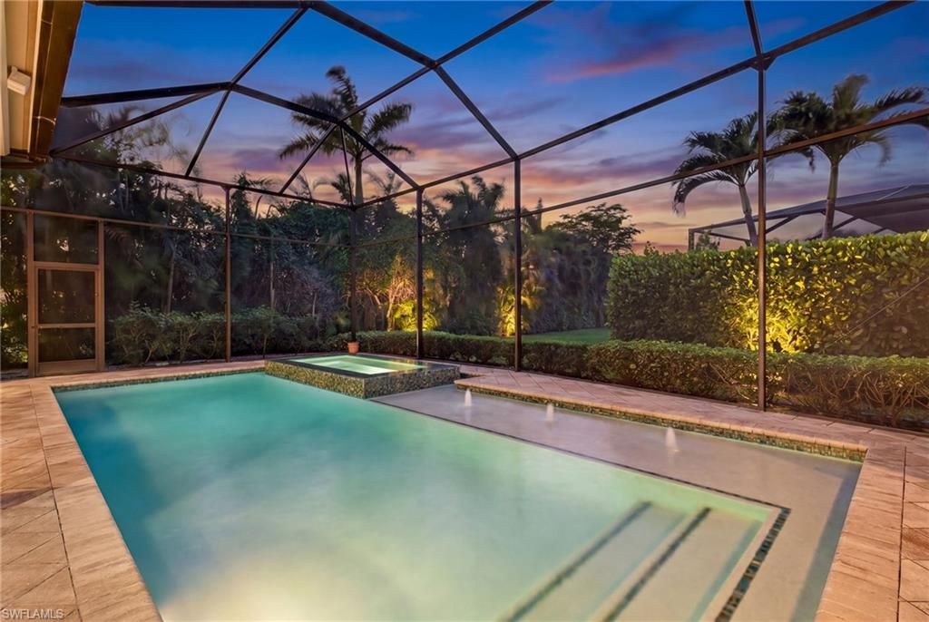 Photo of 628 VENEZIA GRANDE DR, NAPLES, FL 34119 (MLS # 226016841)