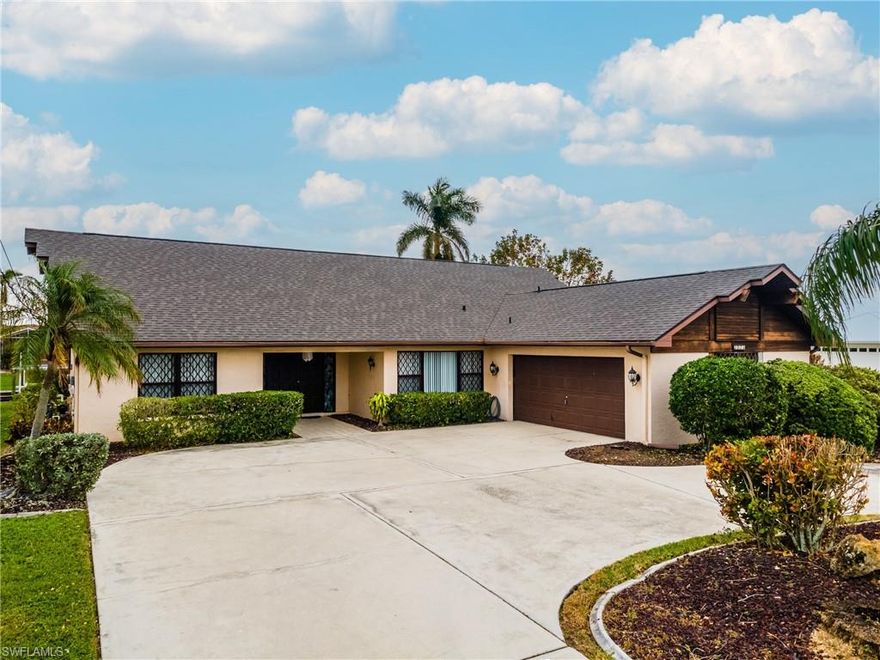 Experience true Southwest Florida waterfront living in this 3-bedroom, 2-bath Gulf access pool home located on a quiet cul-de-sac in desirable SE Cape Coral. This well-maintained home offers over 1,800 square feet of living space with a functional split-bedroom floor plan, vaulted ceilings, and abundant natural light throughout. For added peace of mind, the property features a NEW ROOF installed in 2023 and has NEVER flooded. Boating enthusiasts will love the direct Gulf access canal with over 100 feet of water frontage, sailboat access, and a seawall already in place, providing quick, bridge-free access to open water. Step outside to your private screened lanai and pool area, perfectly positioned to enjoy tranquil canal views and the Florida lifestyle year-round. Inside, the open living and dining areas flow seamlessly into the kitchen, making it ideal for entertaining. The spacious primary suite offers ample closet space and an en-suite bath, while guest bedrooms provide privacy and comfort for family or visitors. Additional highlights include a 2-car garage, interior laundry, and an irrigation system. Conveniently located near shopping, dining, parks, and boat ramps, this home is ideal as a full-time residence, seasonal retreat, or investment opportunity. Schedule your private showing today and start living the waterfront lifestyle.